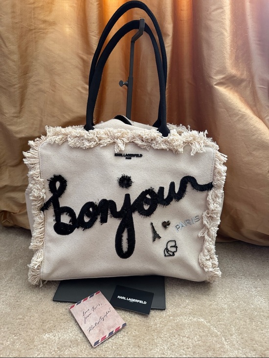 Karl Lagerfeld Handbags - Karl Lagerfeld Canvas 'Bonjour' Fringe Tote in Cream and Black